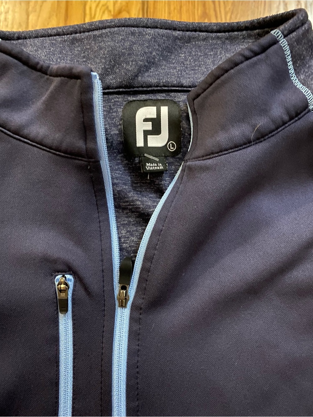 FootJoy Navy Performance Softshell pull over with Light Blue Accents